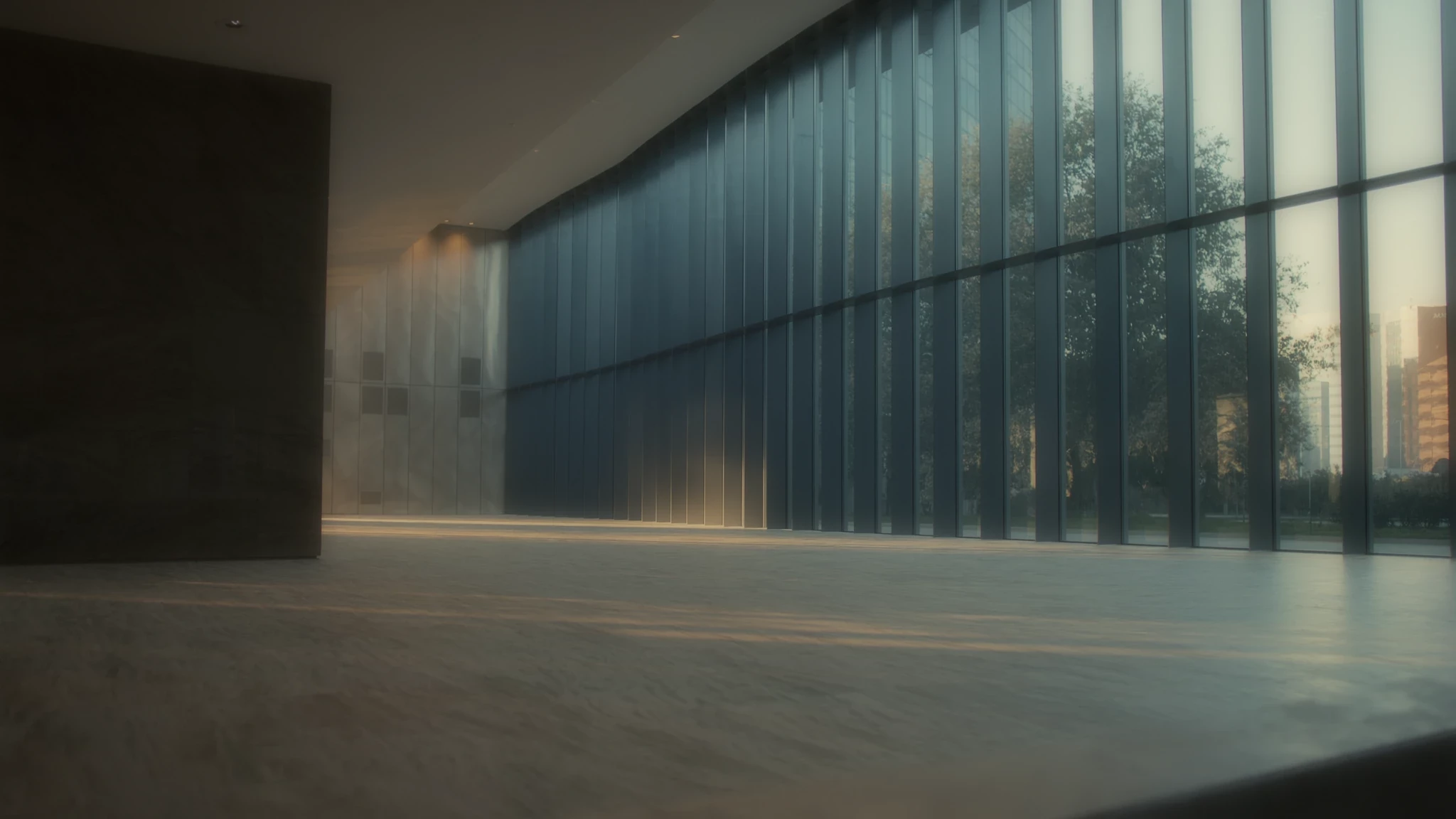 A quiet glass gallery with stone columns and natural light
